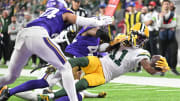 Green Bay Packers wide receiver Jayden Reed (11) scores a touchdown at the Minnesota Vikings in 2023.