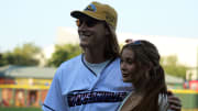 Jaguars quarterback Trevor Lawrence and his wife, Marissa, pose for fans after his ceremonial first pitch before the Jacksonville Jumbo Shrimp's Triple-A baseball home opener against Durham on April 4, 2023. [Clayton Freeman/Florida Times-Union]