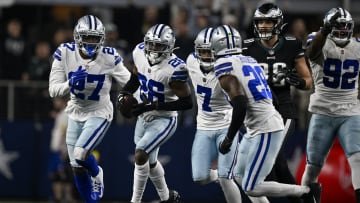 Dec 24, 2022; Arlington, Texas, USA; Dallas Cowboys safety Jayron Kearse (27) and cornerback DaRon Bland (26) and cornerback Trevon Diggs (7) and safety Malik Hooker (28) celebrate after Bland recovers a Philadelphia Eagles fumble during the second half at AT&T Stadium.