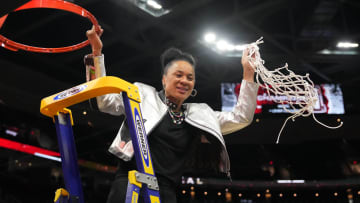 Apr 7, 2024; Cleveland, OH, USA; South Carolina Gamecocks head coach Dawn Staley cuts down the net