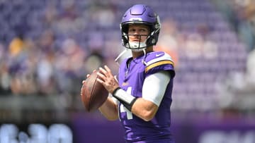 Aug 10, 2024; Minneapolis, Minnesota, USA; Minnesota Vikings quarterback Sam Darnold (14) warms up before the game against the Las Vegas Raiders at U.S. Bank Stadium.