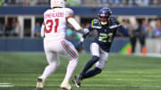 Oct 22, 2023; Seattle, Washington, USA; Seattle Seahawks cornerback Devon Witherspoon (21) covers Arizona Cardinals running back Emari Demercado (31) during the second half at Lumen Field.