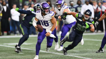 Aug 10, 2023; Seattle, Washington, USA; Minnesota Vikings quarterback Jaren Hall (16) carries the ball while being chased by Seattle Seahawks linebacker Levi Bell (98) during the second half at Lumen Field.