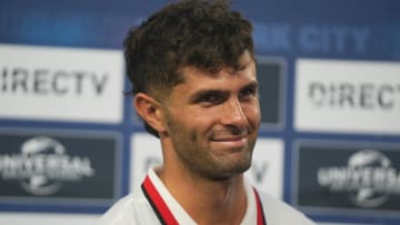 Jul 27, 2024; New York, NY, USA; AC Milan midfielder Christian Pulisic (11) gives an interview after the game against Manchester City at Yankee Stadium. Mandatory Credit: Lucas Boland-USA TODAY Sports