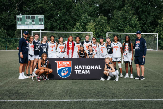 The USA Football team poses for a picture.