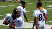 Cincinnati Bengals wide receiver Tee Higgins (5) runs a drill with Ja'Marr Chase and Tyler Boyd during an off-season workout inside Paycor Stadium in downtown Cincinnati on Tuesday, June 13, 2023.