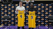 Los Angeles Lakers first round draft pick Dalton Knecht (4) and second round draft pick Bronny James (9) pose at a press conference at the UCLA Health Training Center. 