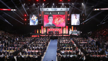 VANCOUVER, BRITISH COLUMBIA - JUNE 21: Kirby Dach reacts after being selected third overall by the Chicago Blackhawks during the first round of the 2019 NHL Draft at Rogers Arena on June 21, 2019 in Vancouver, Canada. (Photo by Bruce Bennett/Getty Images)