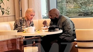 kanye west has lunch with mystery blonde