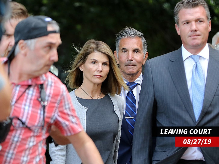 0403-Mossimo-Giannulli-Lori-loughlin-leaving-court-getty01