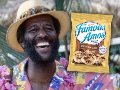 Wally Amos Next To His Cookies