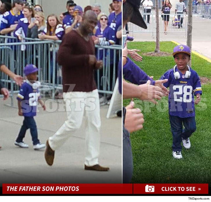 Adrian Peterson and Son -- The High Fivin' Photos