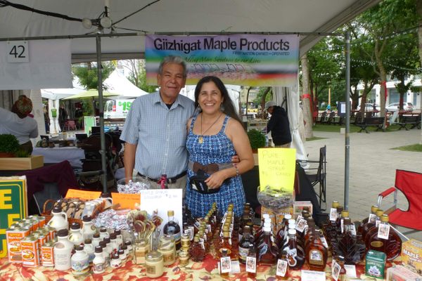 Isaac Day and Deborah Aaron, owners of Giizhigat Maple Products, at the 2020 Planet IndigenUs event in Toronto.