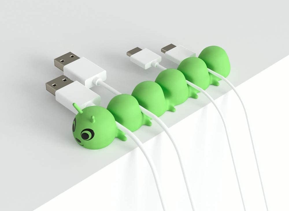 The green caterpillar cord organizer which can hold six cables 