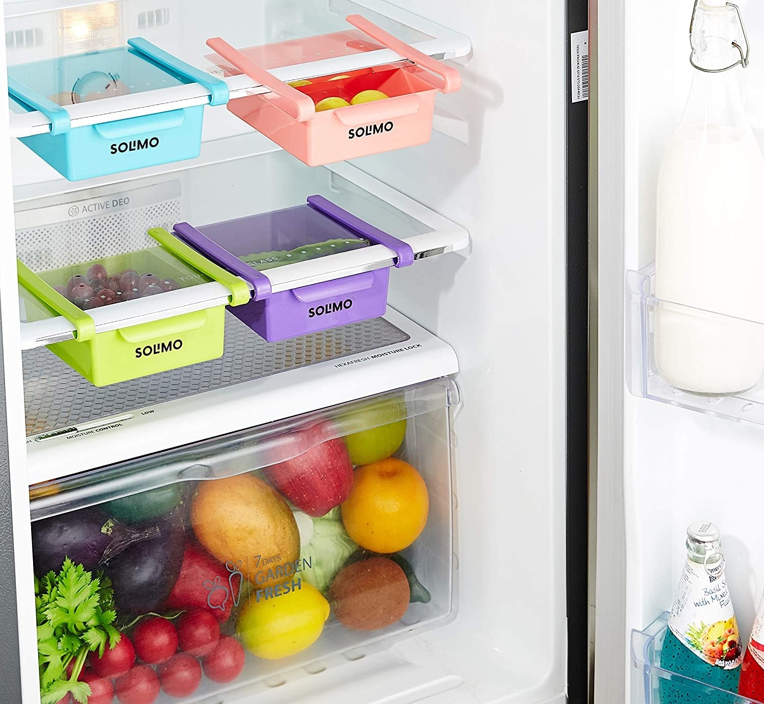 A set of fridge organisers under the shelves 