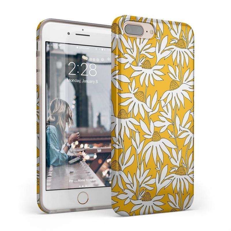 yellow phone cover with white flowers on it 