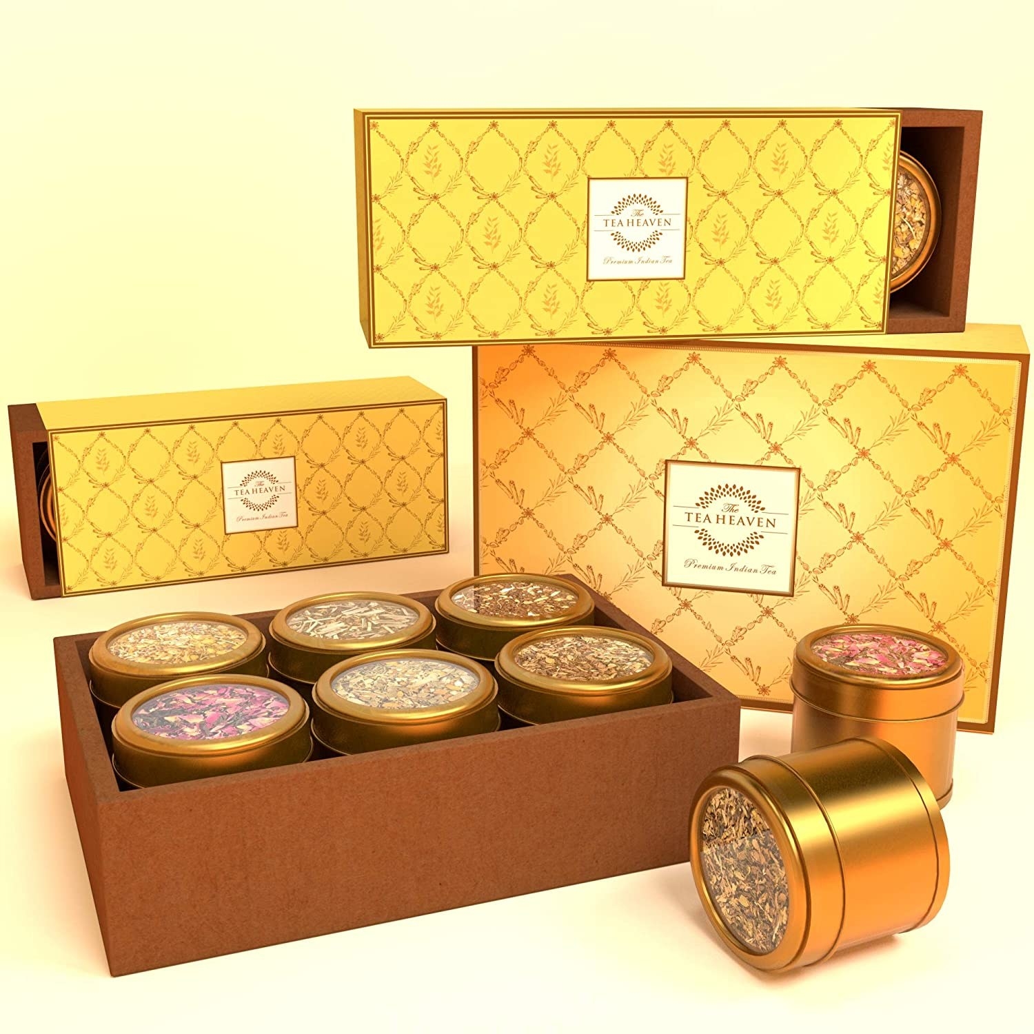 A golden tea box with golden tins of tea