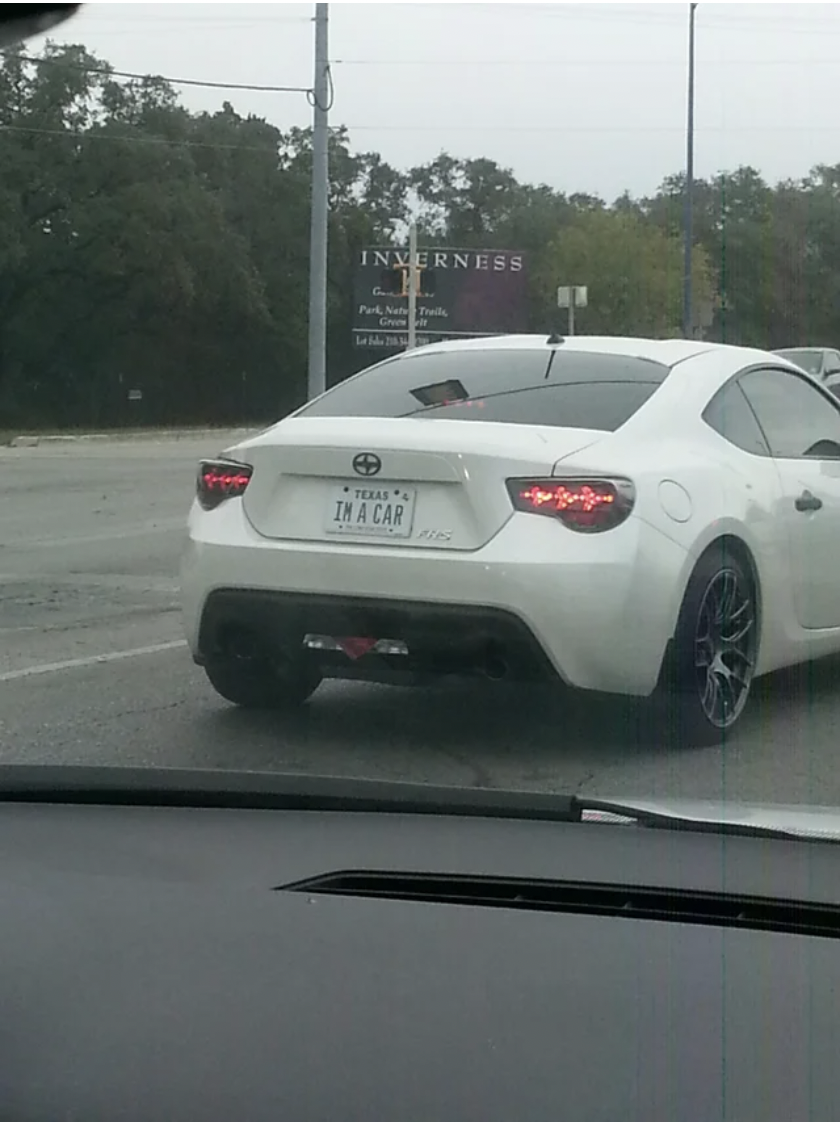 Car with license plate reading &quot;IM A CAR&quot;