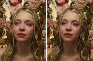 Sydney Sweeney with tears on her face and wet hair, standing in front of a floral background