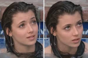 Mia Sara as Sloane in Ferris Bueller's Day Off with wet hair in a pool, looking upward with a calm expression. She wears hoop earrings. No text present