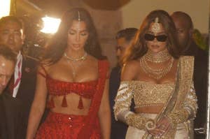 Kim Kardashian in an embellished outfit, and Khloé Kardashian in a sparky outfit