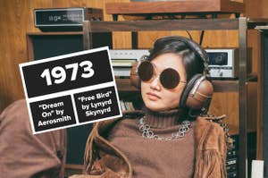 A woman in retro-style clothing and large headphones sits relaxed. The text on the image reads "1973: 'Dream On' by Aerosmith, 'Free Bird' by Lynyrd Skynyrd."