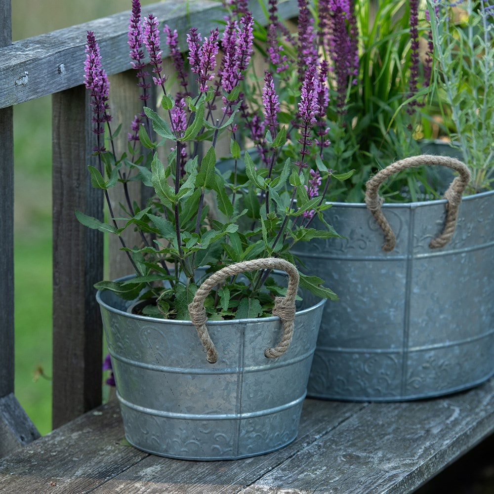 Galvanised metal planter with rope handles