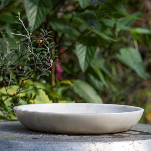 Turned white marble bird bowl