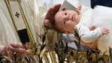 Pope Francis baptises babies in Sistine Chapel in Vatican City