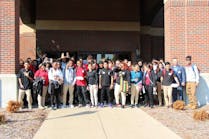 Union High School students in front of American Seating s transportation plant in Grand Rapids Michigan 5811e37d8d81c