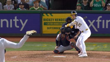 Tigers challenge the HBP during Rooker's at-bat