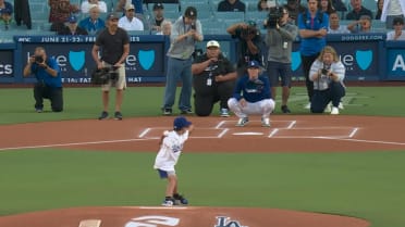 Young Yoshinobu Yamamoto fan throws out first pitch