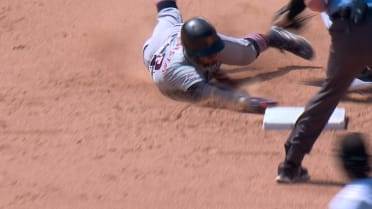 Zach McKinstry steals second base after a review