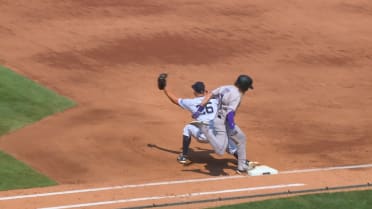 Jake Cave is safe at first after a review