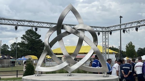 The sculpture combines a Celtic trinity shape intertwined with a heart