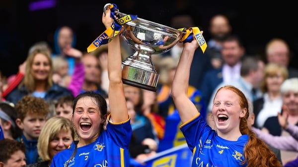 Tipperary's Lucy Spillane and Emma Cronin lift the Mary Quinn Memorial Cup following the TG4 All-Ireland Ladies Football Intermediate Championship final