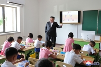 N. Korean leader attends class for children from flood-hit regions