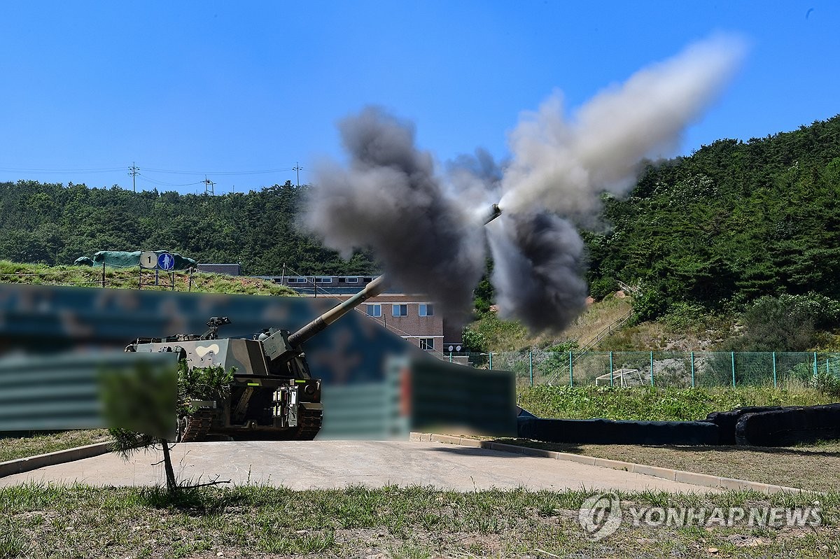 This photo, provided by the Marine Corps on June 26, 2024, shows the Marine Corps conducting a live-fire exercise, involving K9 howitzers, at border islands. (PHOTO NOT FOR SALE) (Yonhap) 