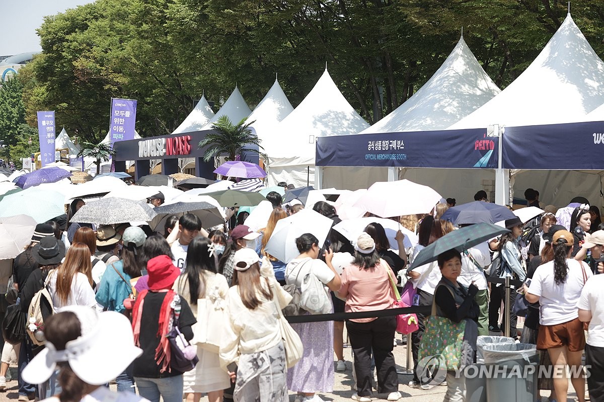 Fans of K-pop sensation BTS wait in line to attend 2024 BTS Festa, an annual event hosted by BTS' agency, BigHit Music, to celebrate the band's debut anniversary, at the Seoul Sports Complex in southern Seoul on June 13, 2024. (Yonhap)