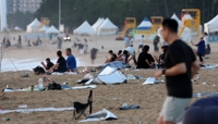 Beach covered with trash