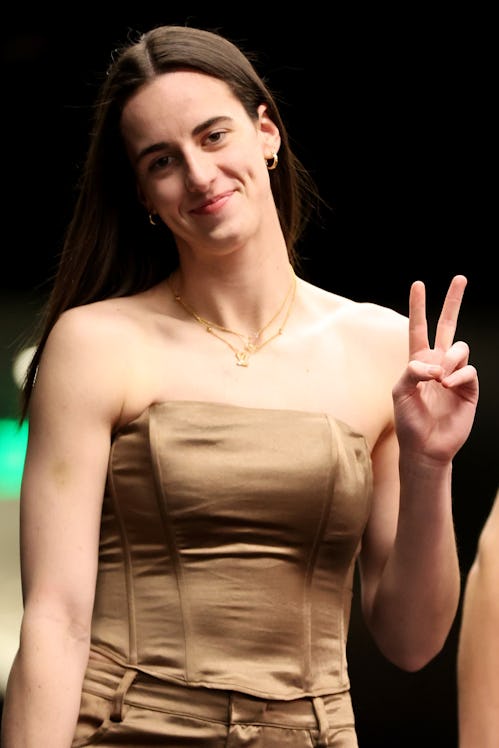 SEATTLE, WASHINGTON - JUNE 27: Caitlin Clark #22 of the Indiana Fever arrives before the game agains...