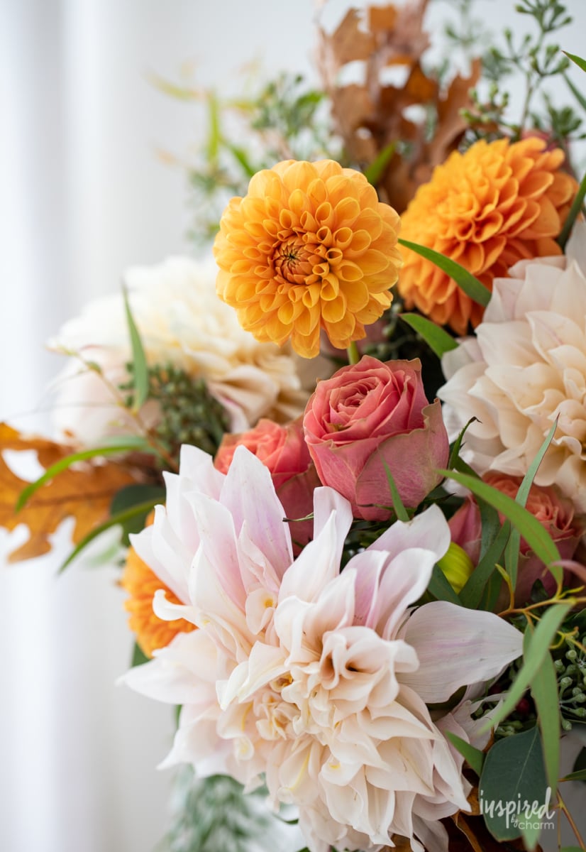 up close photos of dahlias and roses in a vase. 