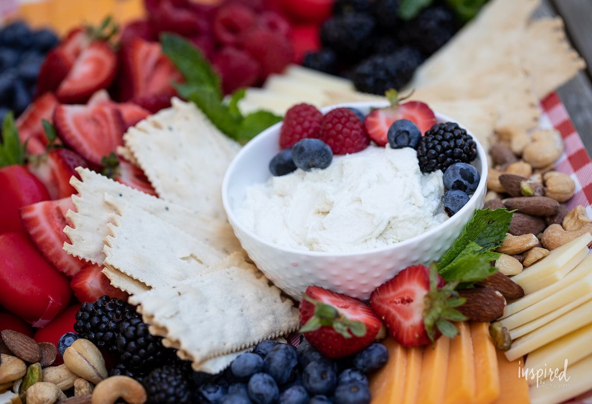 whipped honey goat cheese spread in bowl.