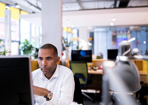 man behind computer