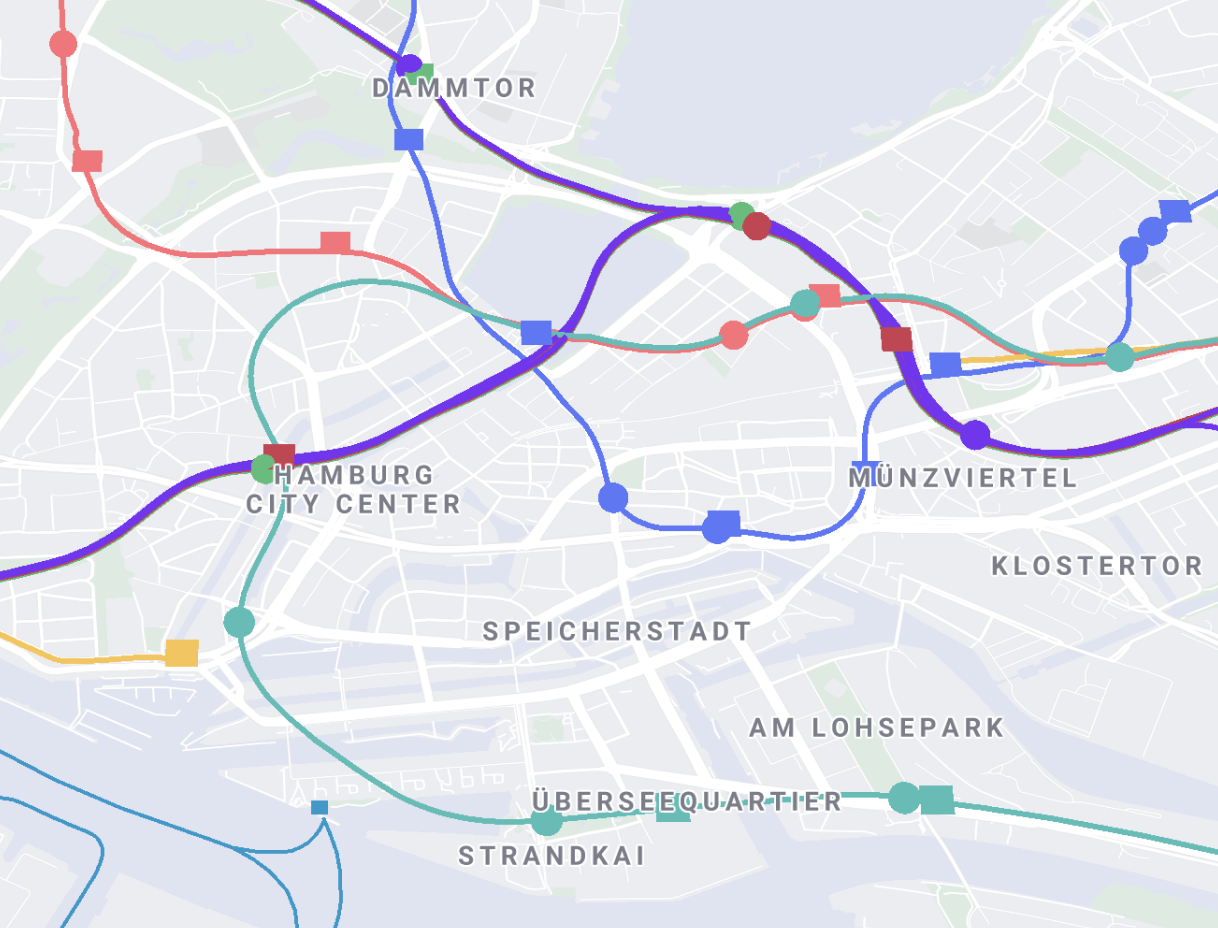 Different colored squares moving on paths on a map