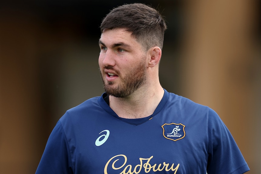 Liam Wright looks to his right at a Wallabies training session.