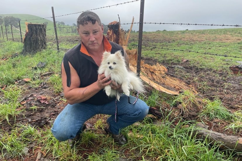 Pom Pom dog with owner Scott McKinnon