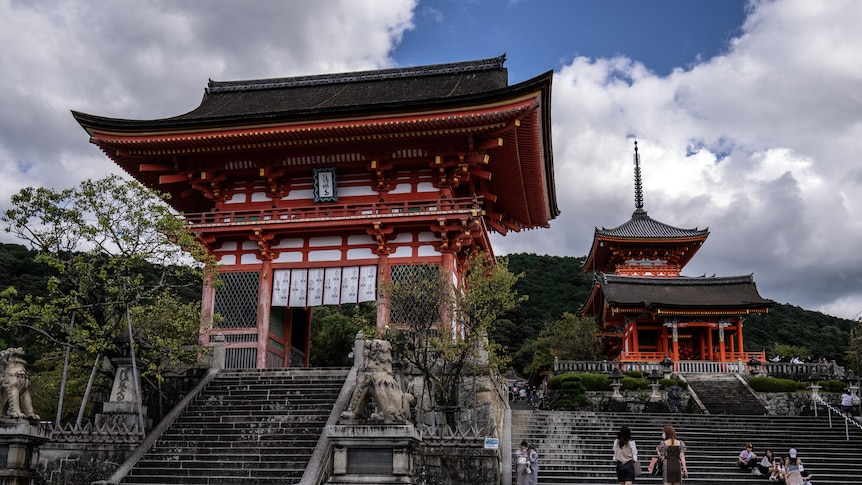 Nio-mon gate of the Kiyomizu-dera Temple, with trees and stairs in front