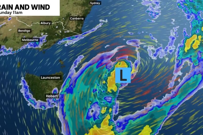 A weather map shows a low system off the east coast of Tasmania.