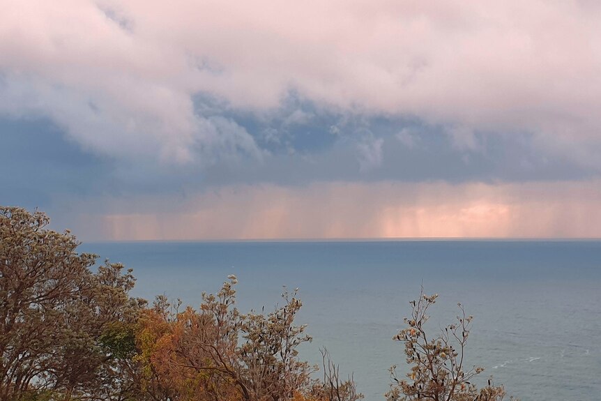 Storm clouds gather over Cracknet Lookout on the new south wales Central Coast